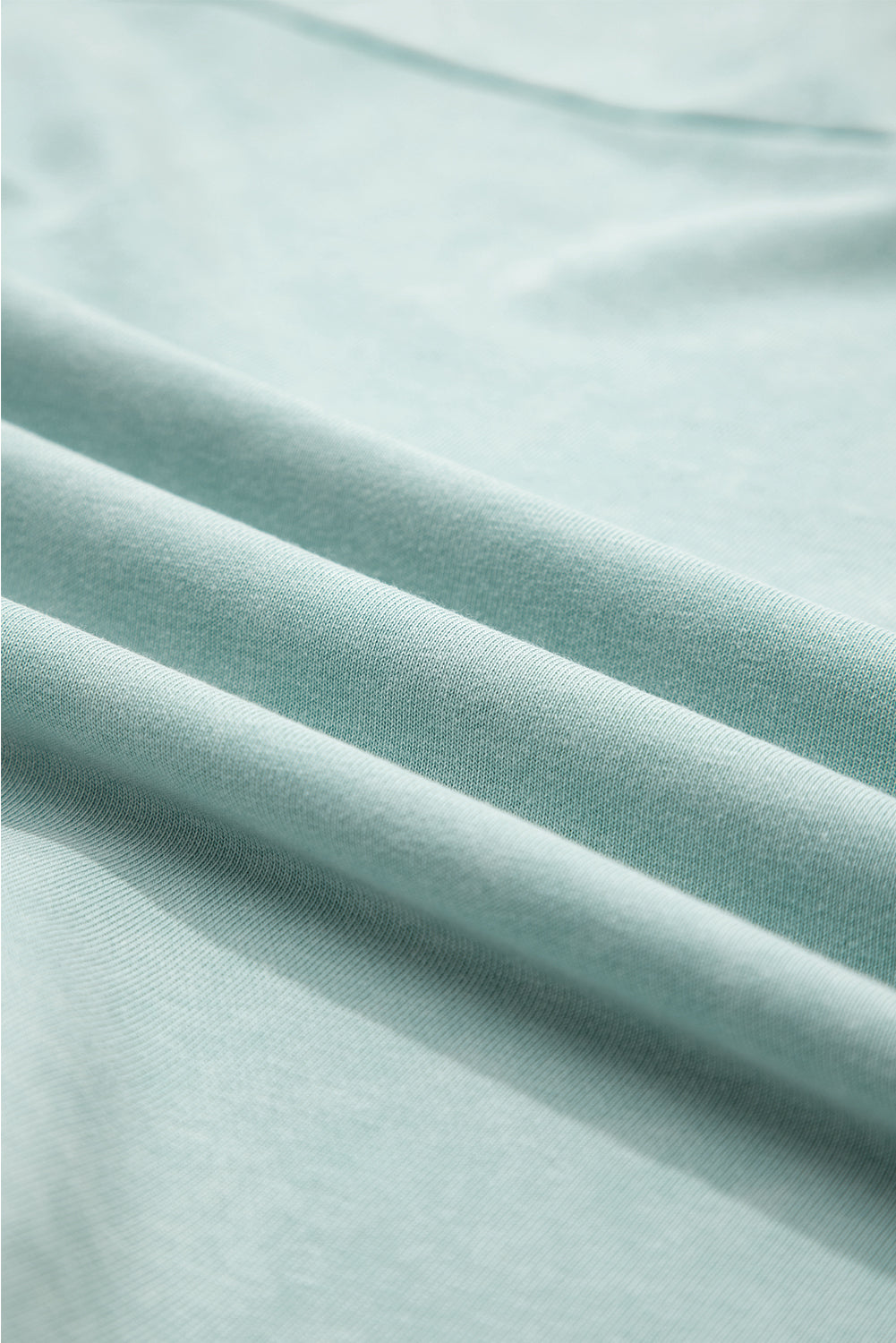 Mineral Wash Reverse Seam Buttoned V-Neck Top