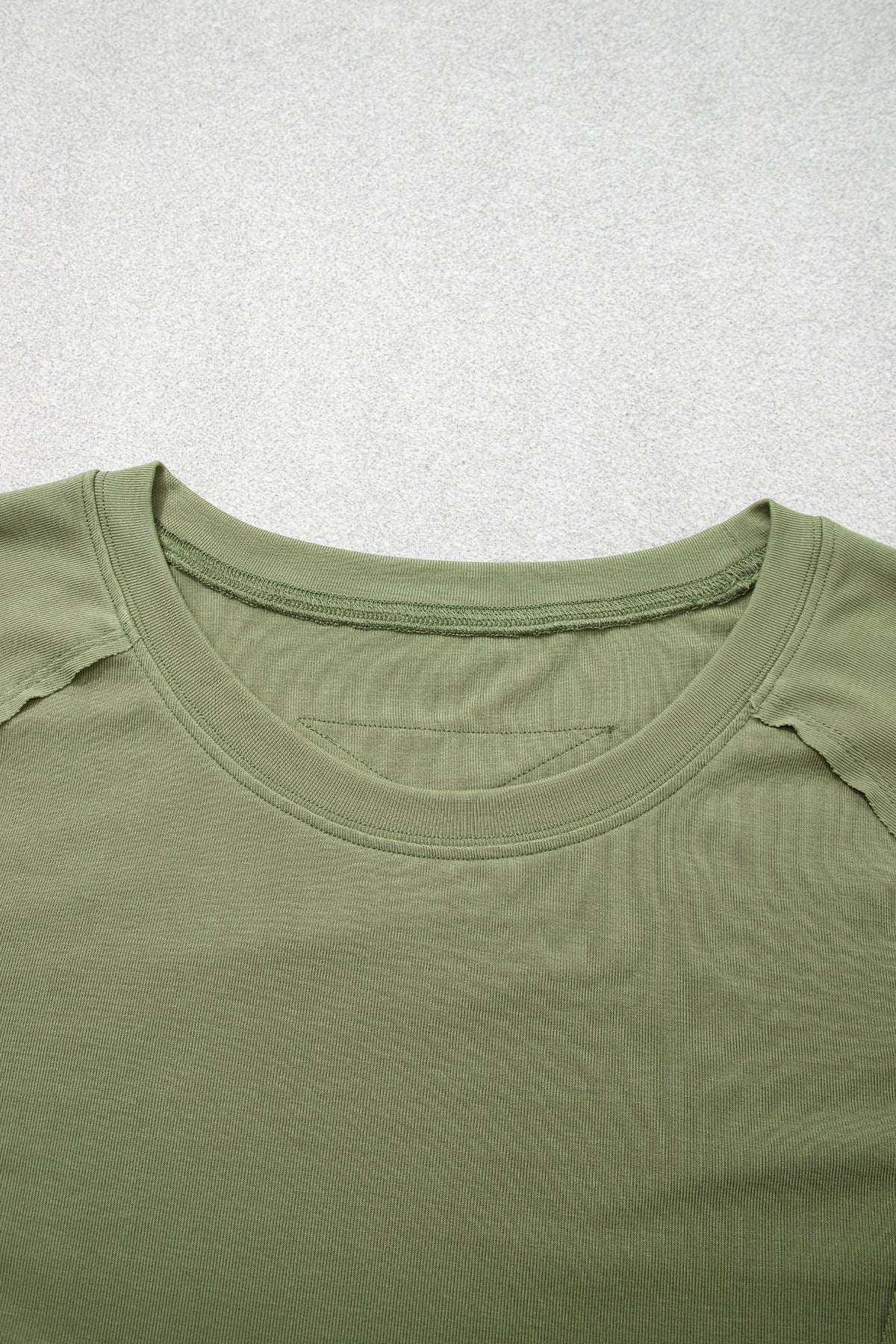Solid Reverse Seam Paneling Long Sleeve Top