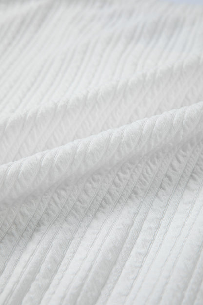 Solid Textured Drop Shoulder Peplum Top