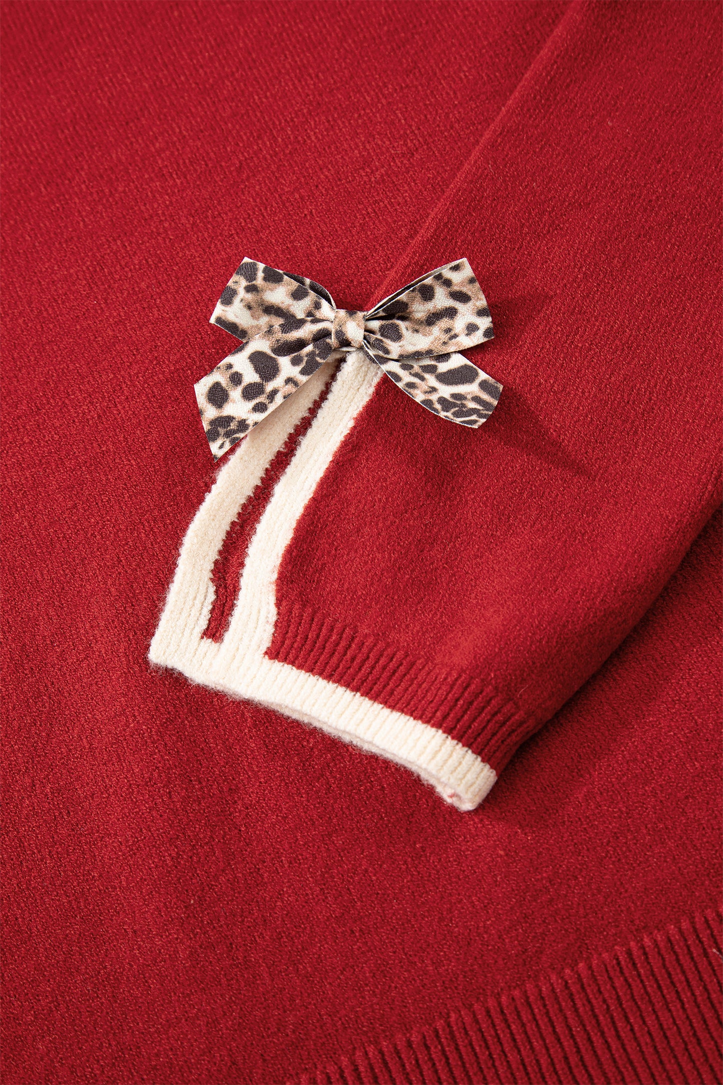 Leopard Bow Split Cuff Contrast Trim Sweater