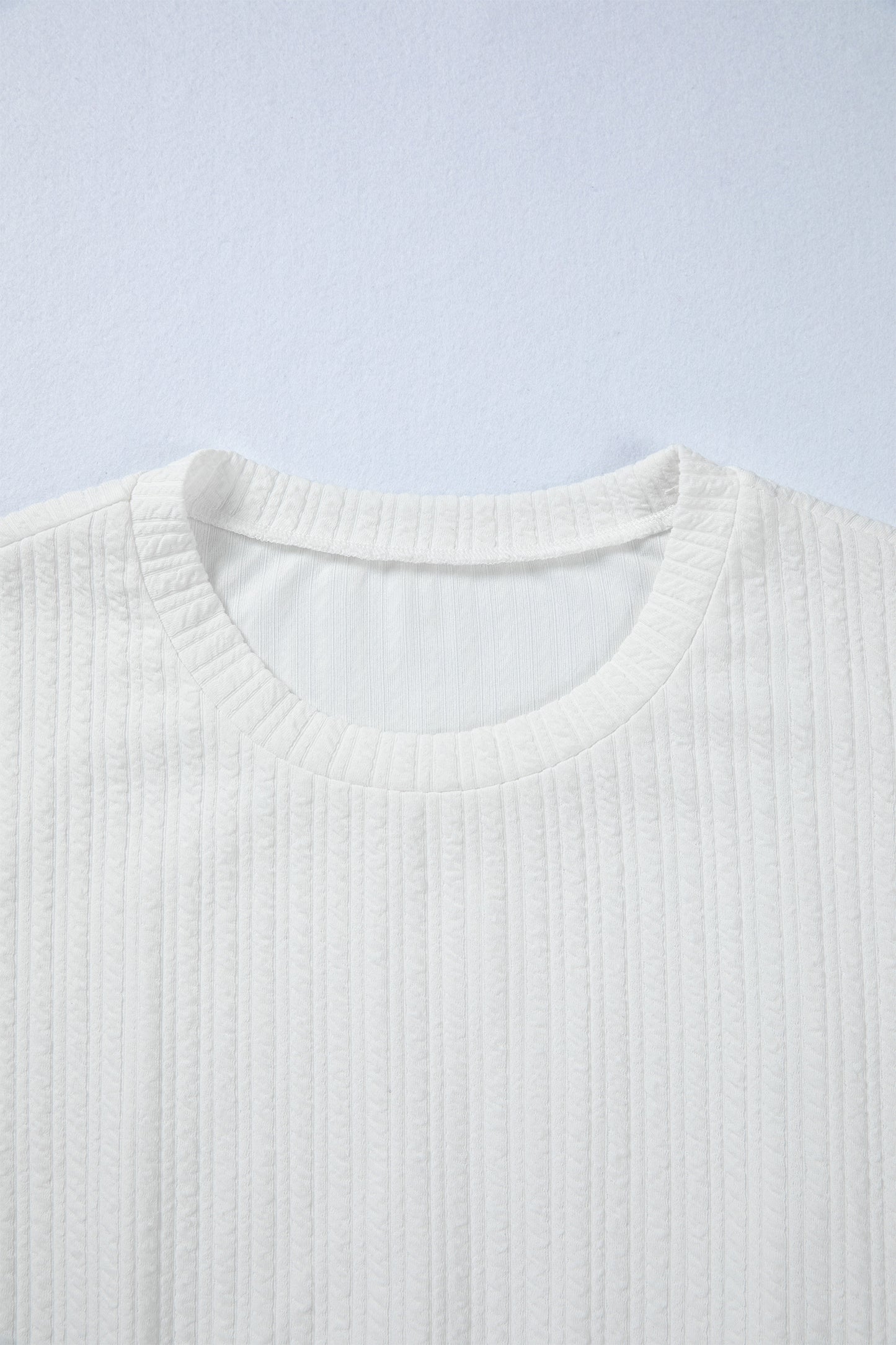 Solid Textured Drop Shoulder Peplum Top