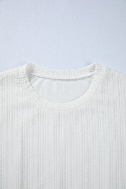 Solid Textured Drop Shoulder Peplum Top