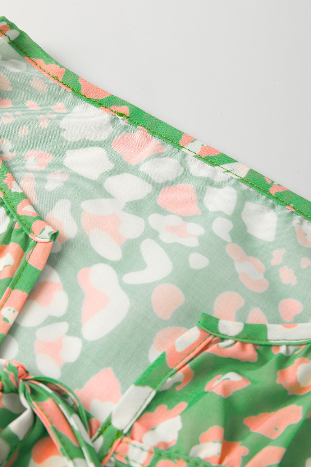 Abstract Leopard Tie Front Flutter Sleeve Blouse