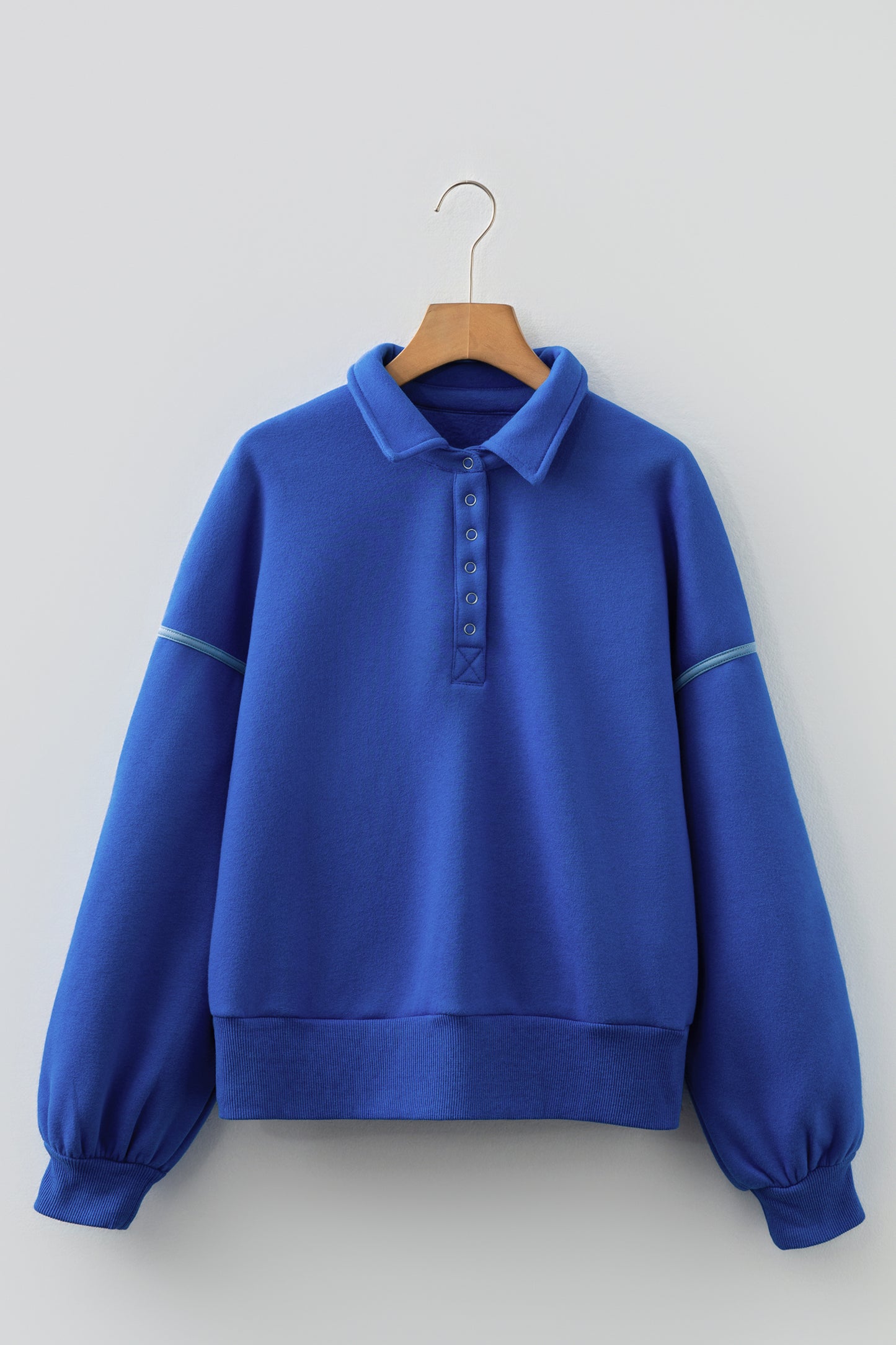Collared Snap Button Exposed Seam Sweatshirt