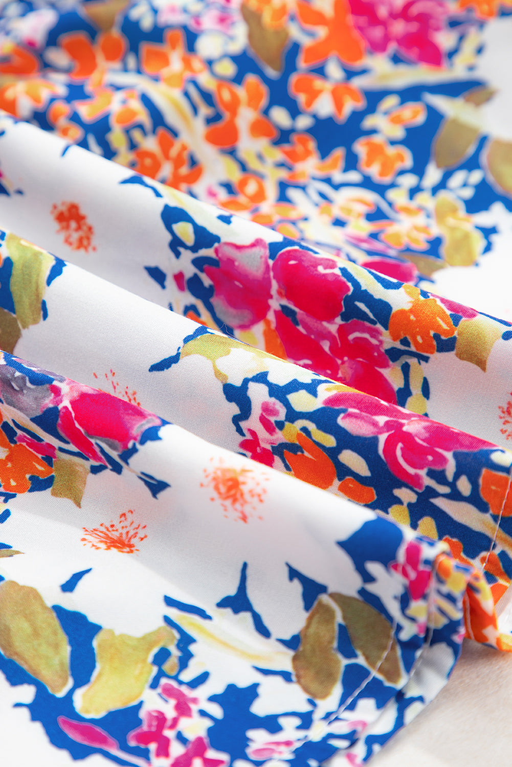 Floral Bow Tie Sleeveless Peplum Blouse