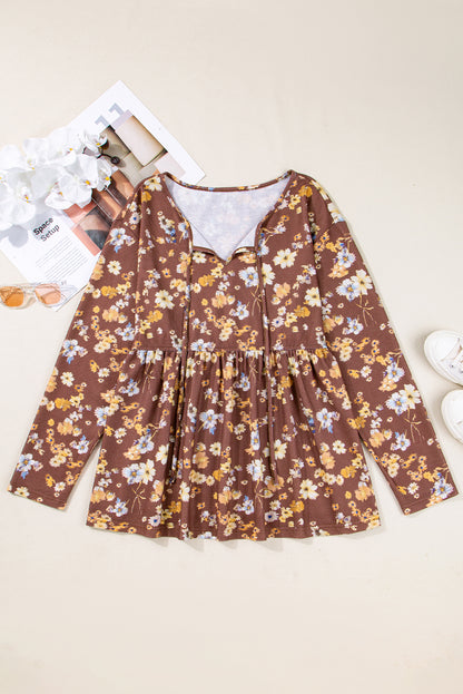 Plus Size Floral Textured Tied Neck Babydoll Blouse