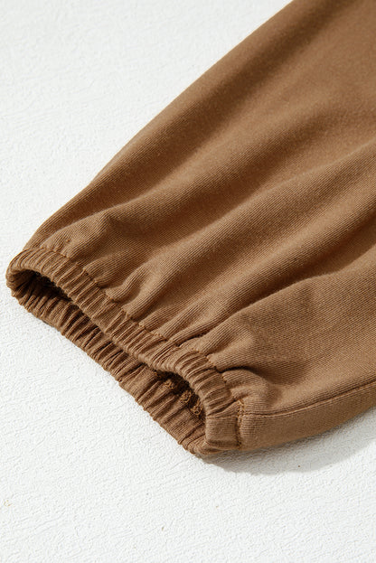 Solid Smocked Split V-Neck Buttoned Blouse