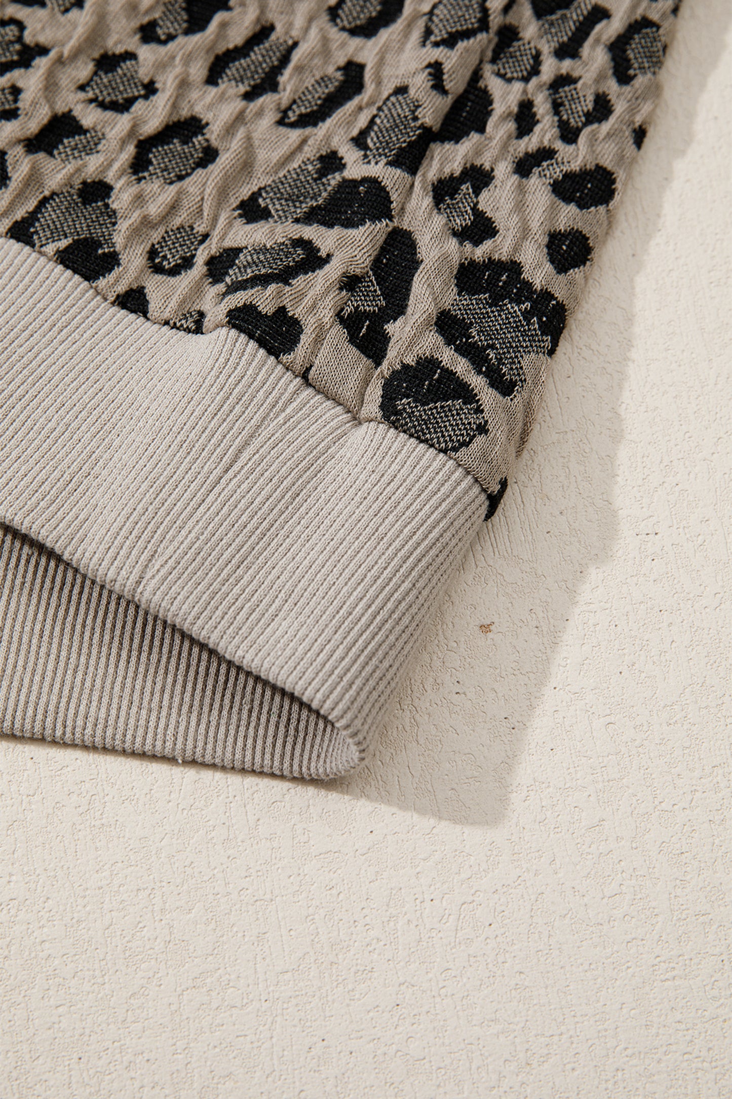 Leopard Zip-Up Collared Cap Sleeve Top