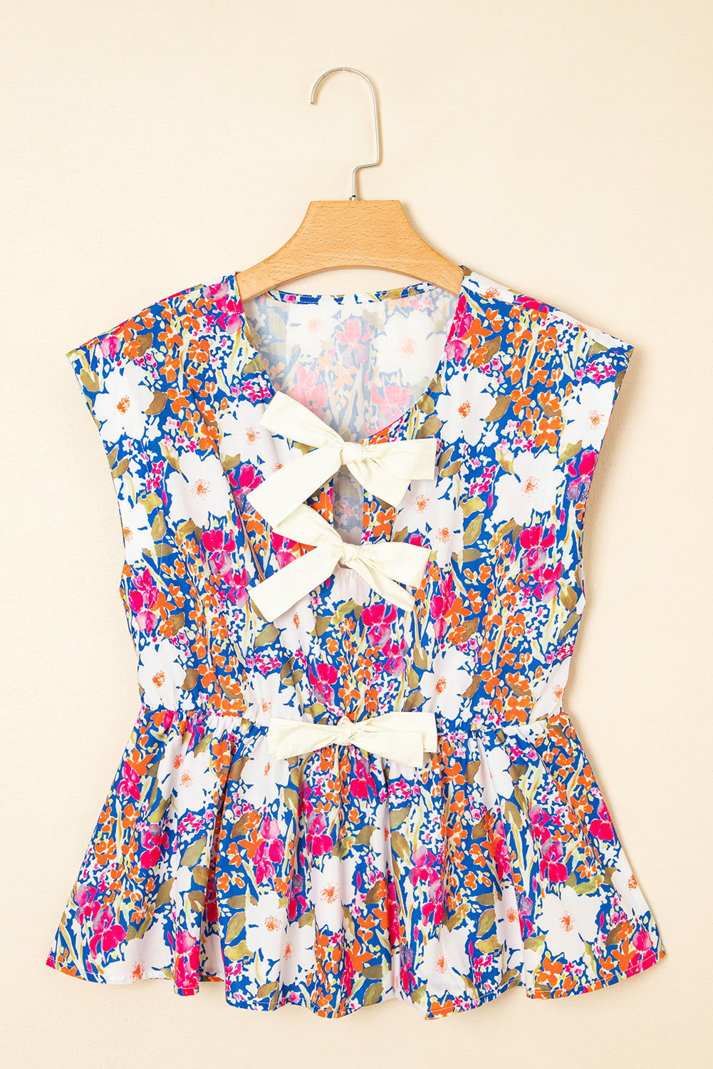 Floral Bow Tie Sleeveless Peplum Blouse