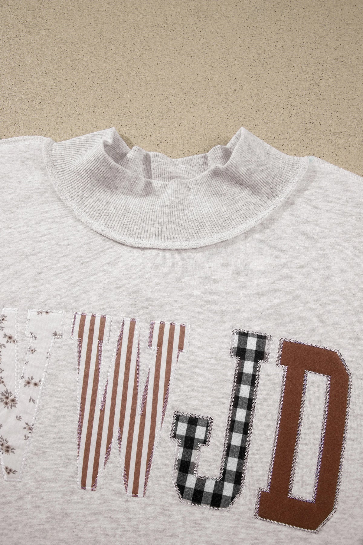 Plus Size WWJD Letter Print Exposed Seam Sweatshirt