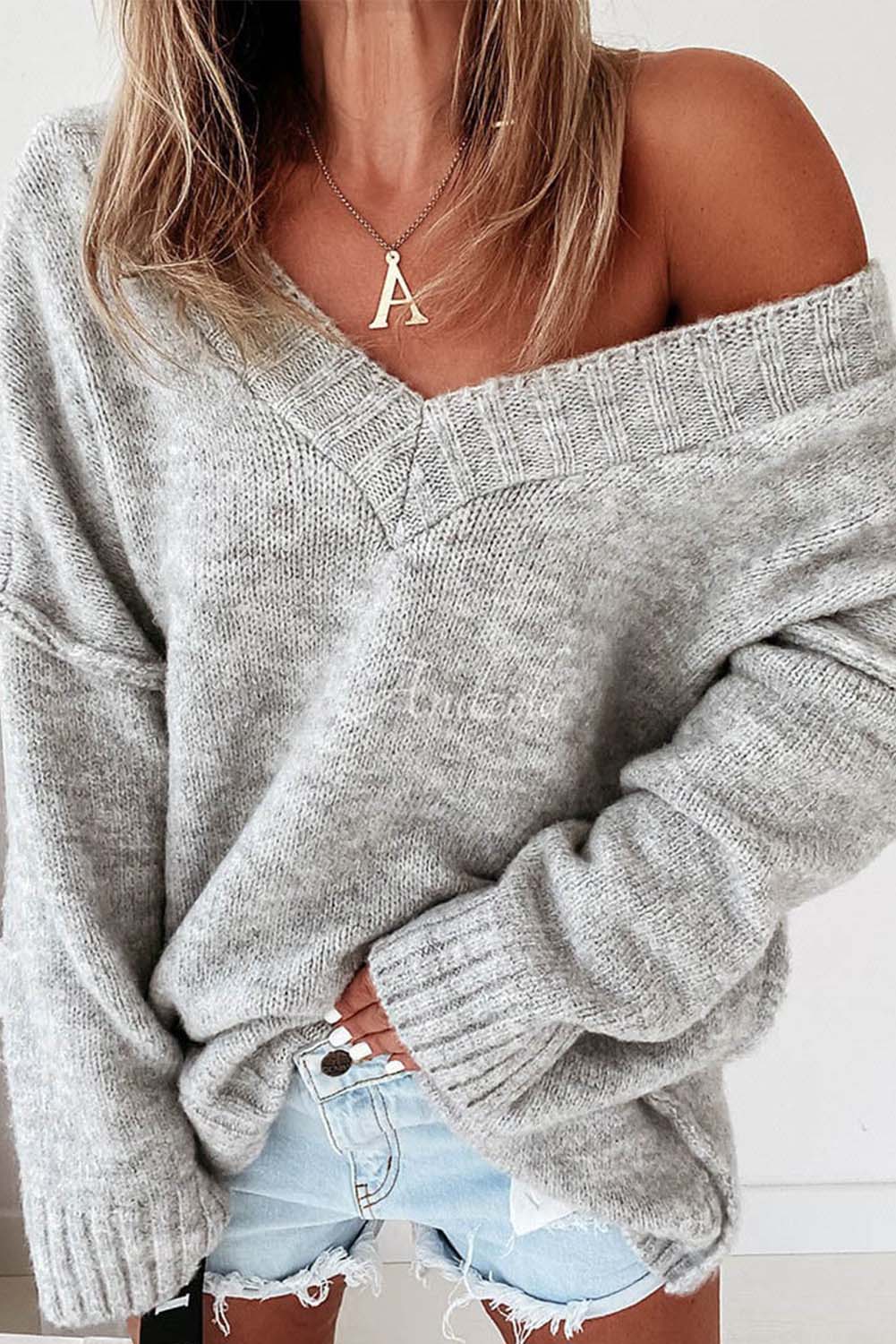 Ribbed V-Neck Exposed Seam Sweater