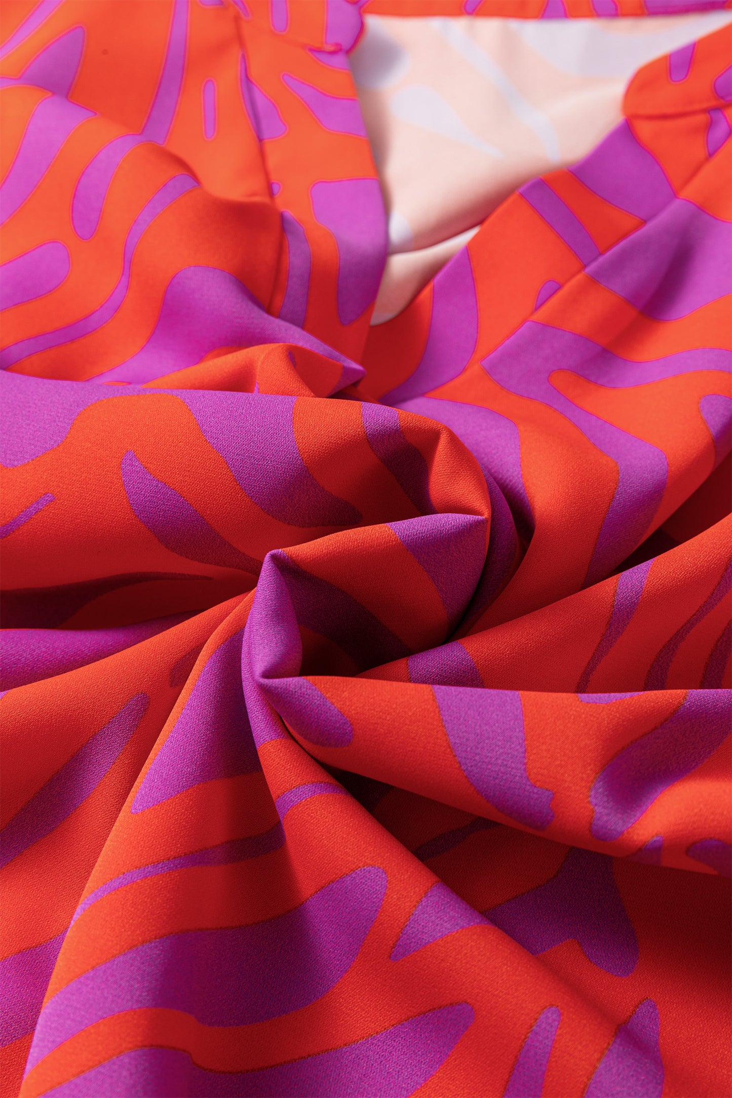 Abstract V-Neck Cuffed Short Sleeve Blouse