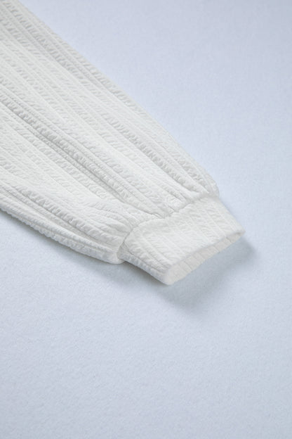 Solid Textured Drop Shoulder Peplum Top