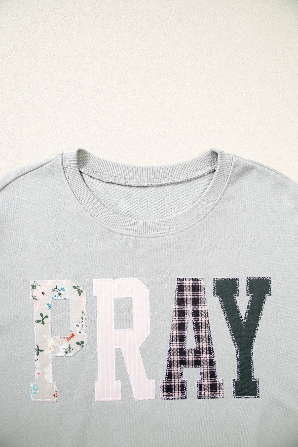 PRAY Embroidered Patchwork Drop Shoulder Sweatshirt