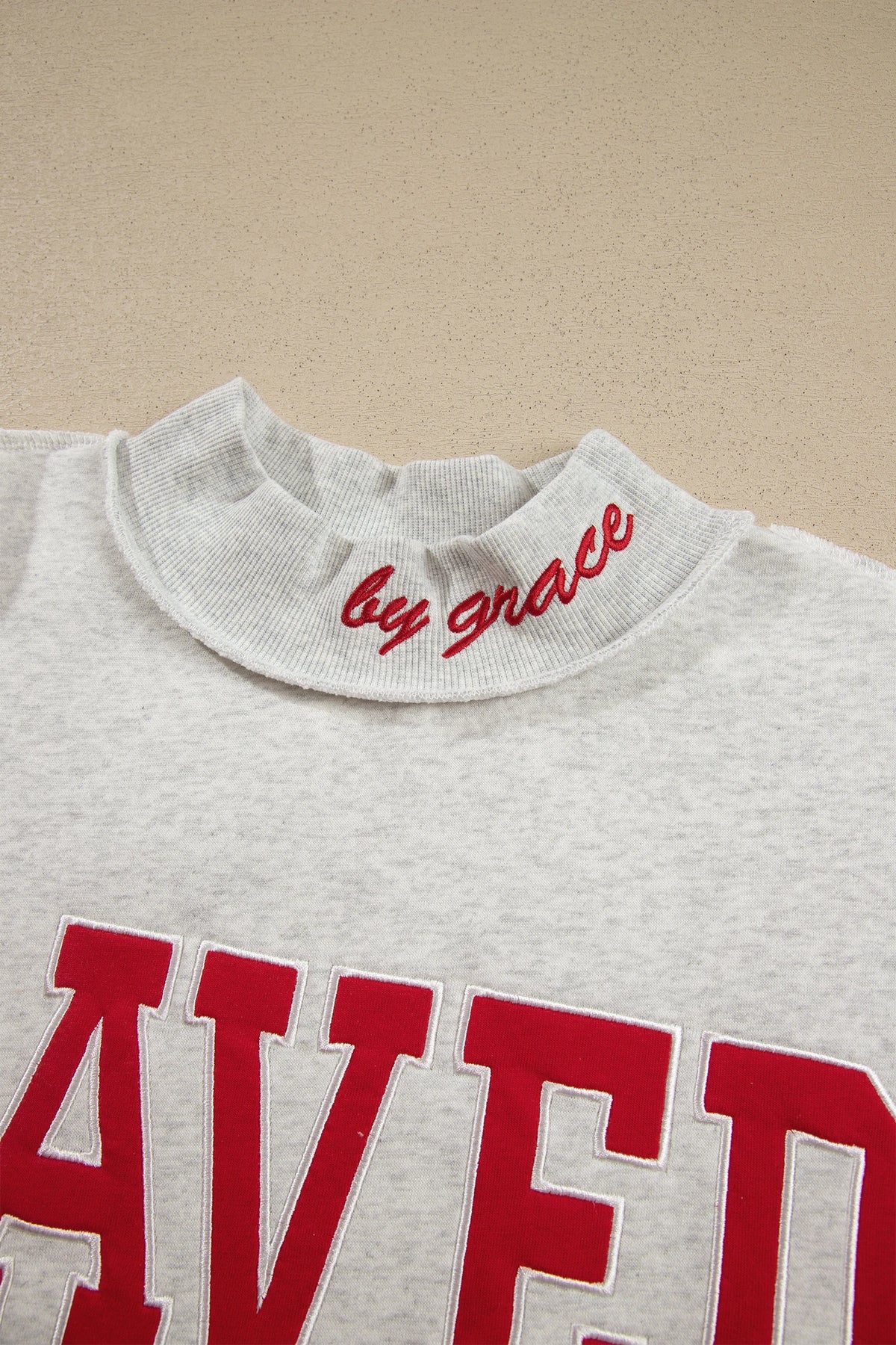 Saved By Grace Embroidered Graphic Mock Neck Sweatshirt