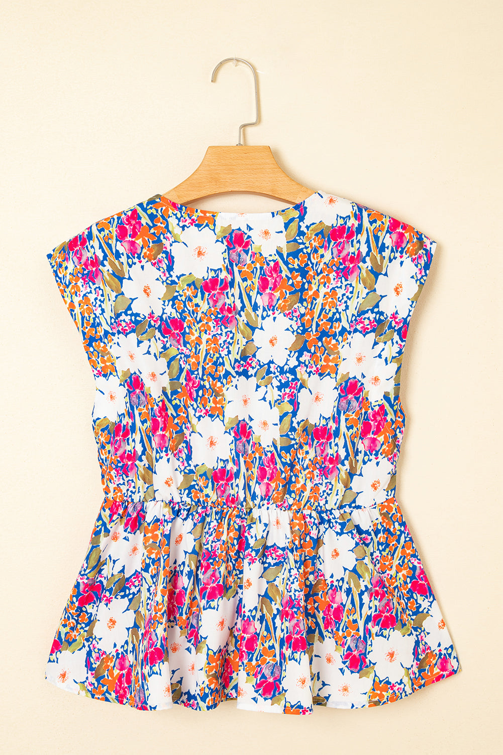Floral Bow Tie Sleeveless Peplum Blouse