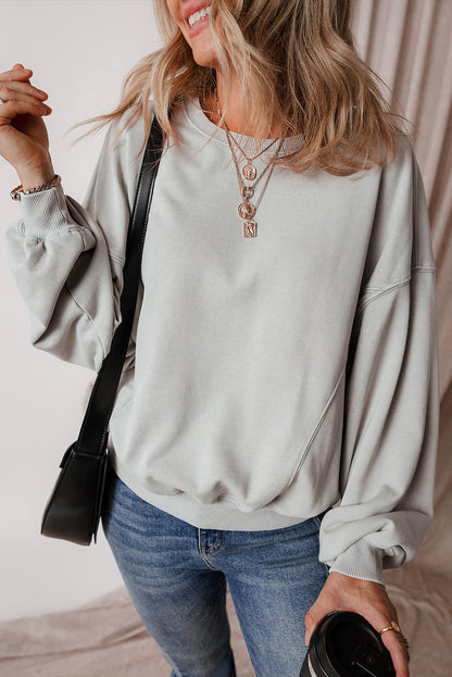 Reserve Seam Batwing Sleeve Sweatshirt