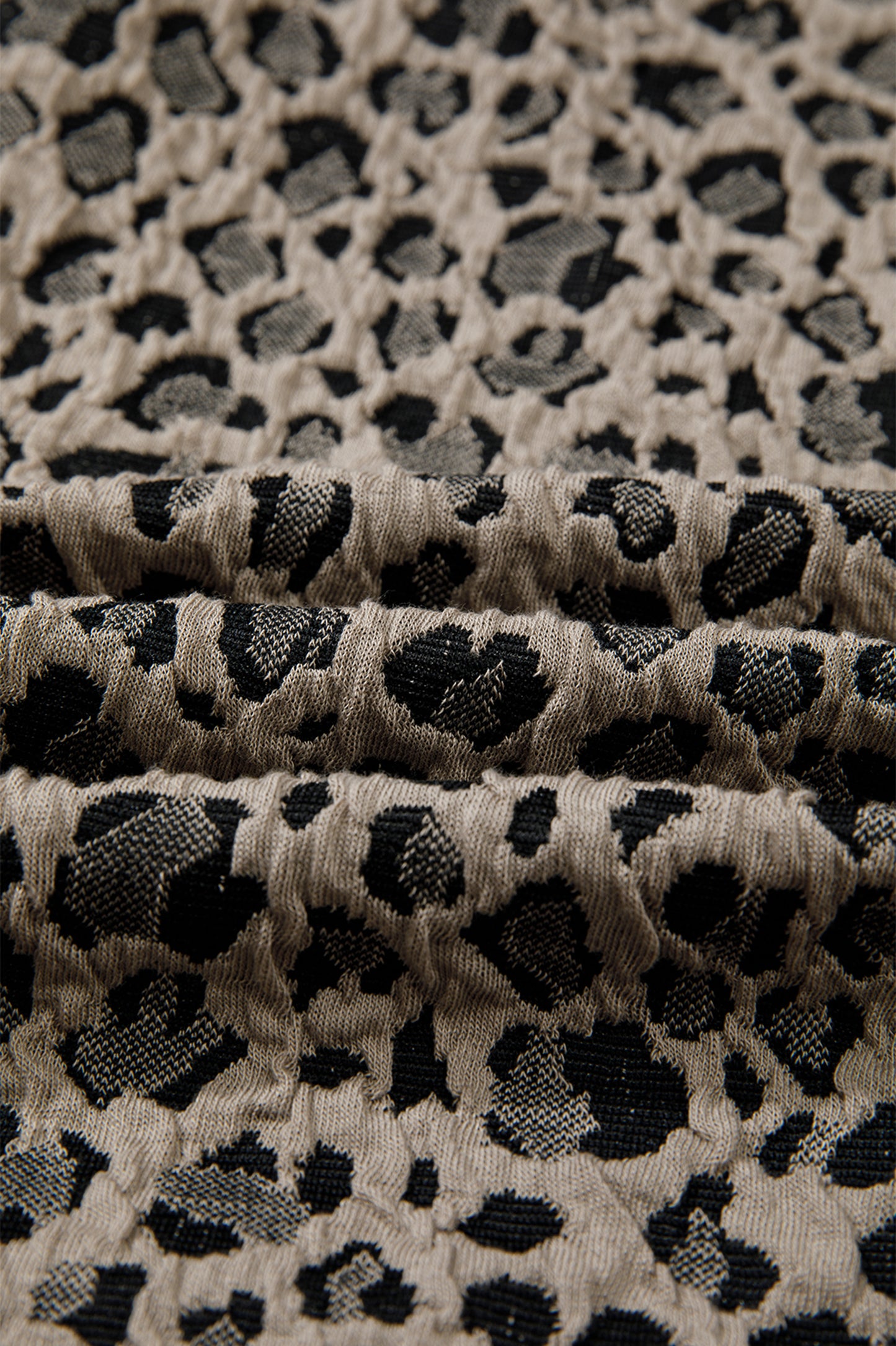 Leopard Zip-Up Collared Cap Sleeve Top