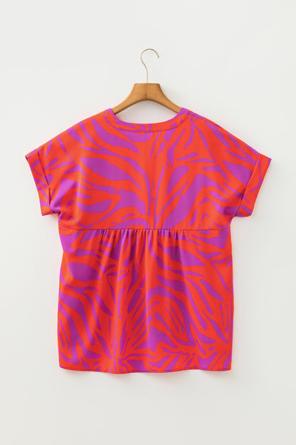 Abstract V-Neck Cuffed Short Sleeve Blouse