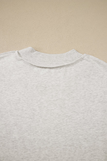 Solid Exposed Seam Mock Neck Tee
