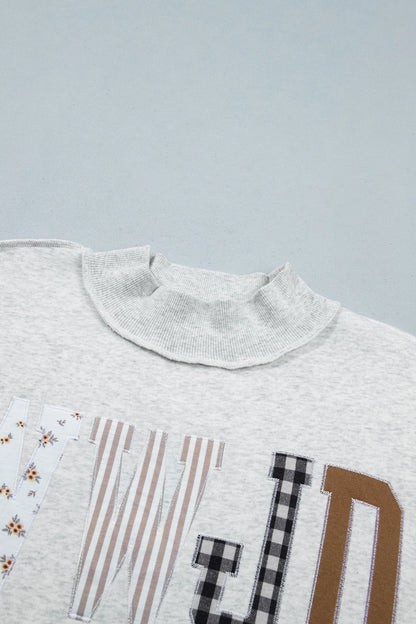 WWJD Embroidered Patchwork Mock Neck Sweatshirt