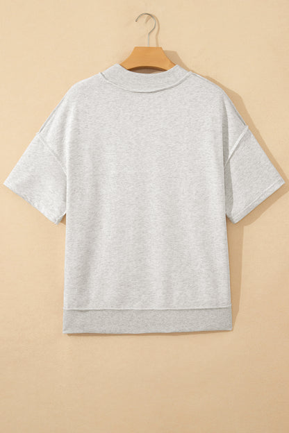 Solid Exposed Seam Mock Neck Tee